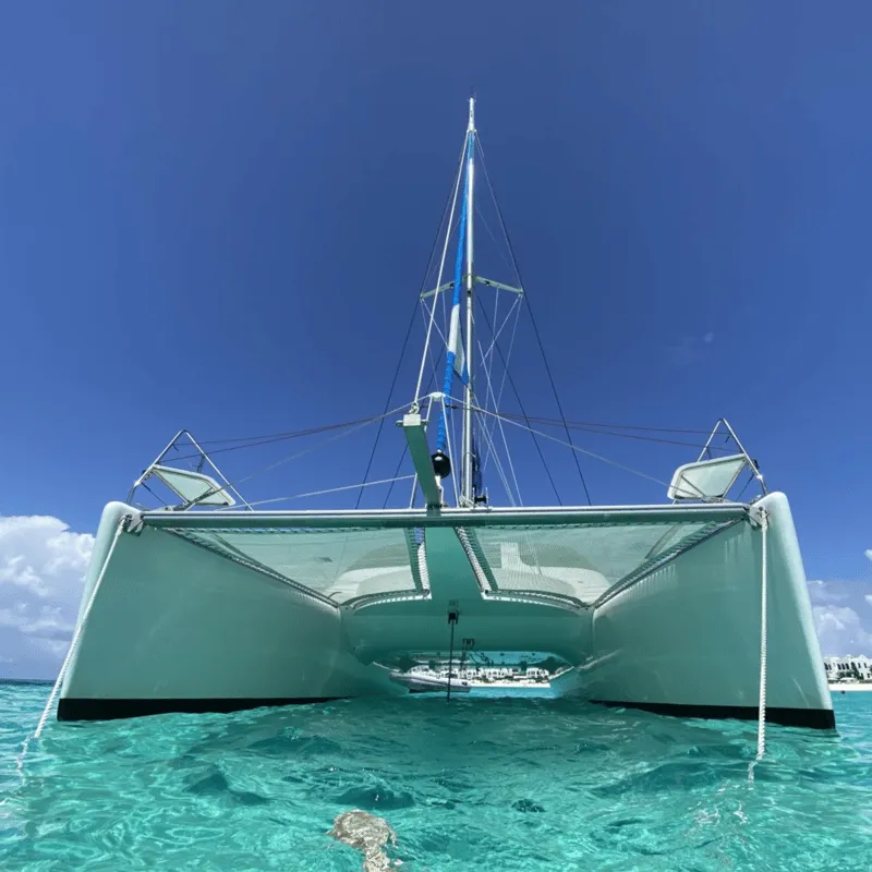 Catamaran anchored off Creole Rock for snorkeling on a St Maarten snorkeling cruise with open bar in St Maarten